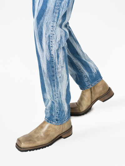 Shop John Elliott The Daze Tapered-leg Jeans In Blau