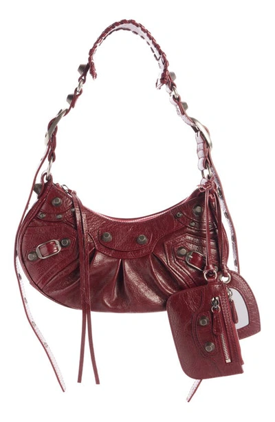Shop Balenciaga Extra Small Le Cagole Lambskin Shoulder Bag In Brick Red