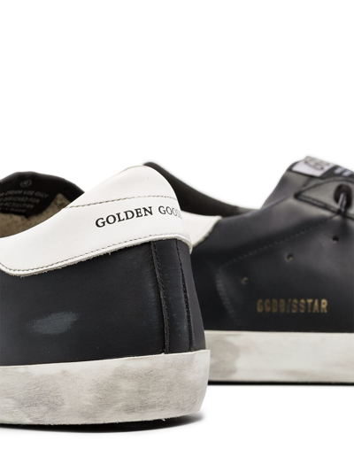 Shop Golden Goose Super-star Leather Sneakers In Black