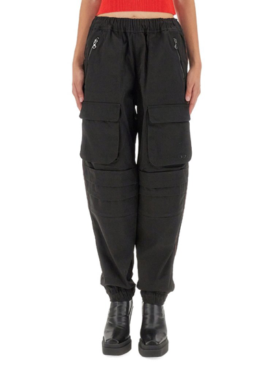 Shop Diesel Zip Detailed Tapered Trousers In Black