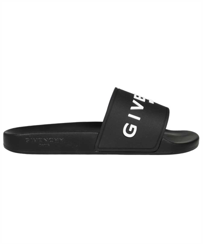 Shop Givenchy Slide Flat Rubber Sandals In Black