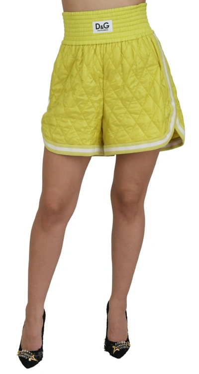 Shop Dolce & Gabbana Yellow Nylon Quilted High Waist Bermuda Women's Shorts