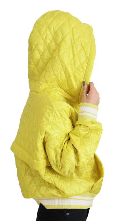 Shop Dolce & Gabbana Yellow Nylon Quilted Hooded Pullover Women's Jacket
