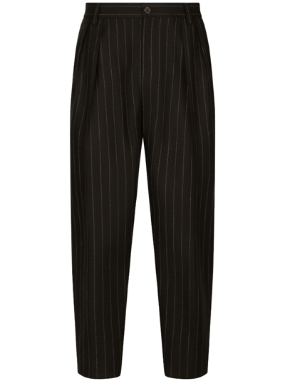 Shop Dolce & Gabbana Pinstripe Wool Tapered Trousers In Black