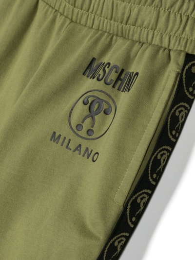 Shop Moschino Logo-print Cotton Track Pants In Green