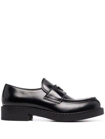 Shop Prada Logo-plaque Chunky-sole Loafers In Nero
