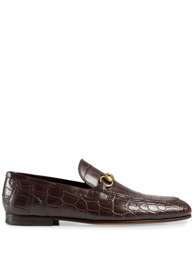 Shop Gucci Jordaan Crocodile Loafers In Brown