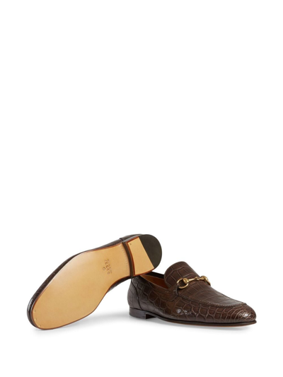 Shop Gucci Jordaan Crocodile Loafers In Brown