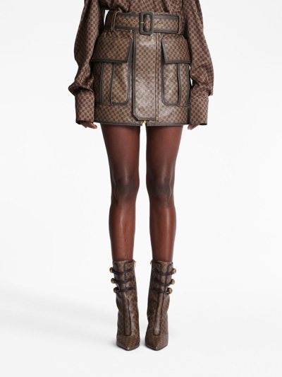 Shop Balmain Monogram-print Leather Miniskirt In Brown