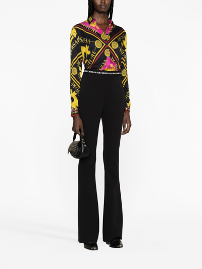 Versace Jeans Couture Logo Waistband Flared Trousers In Black