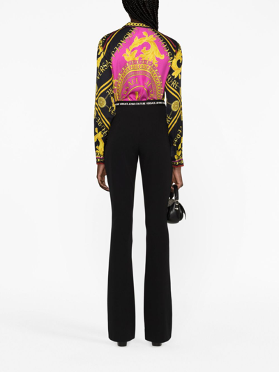 Versace Jeans Couture Logo Waistband Flared Trousers In Black