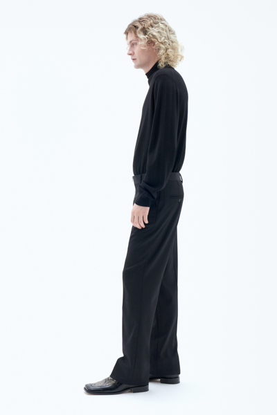 Shop Filippa K Bootcut Zip Trousers In Black