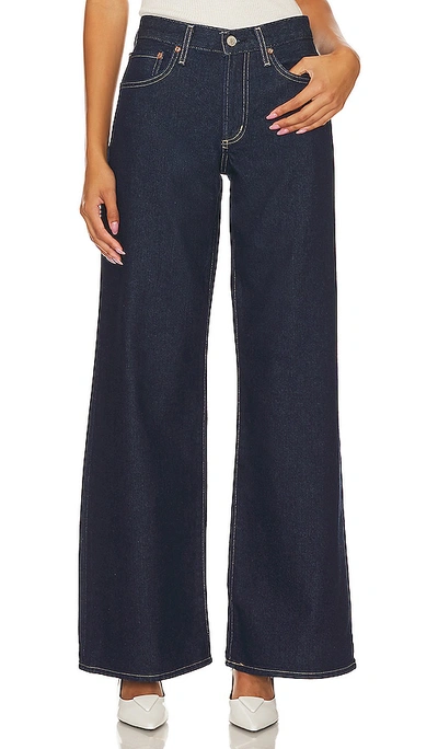 Shop Agolde Clara Low Rise Baggy Flare In Blue