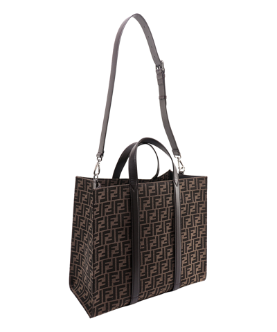 Shop Fendi Handbag In Brown