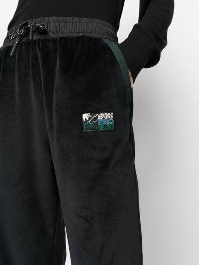 Shop Moncler Logo-patch Velvet-finish Track Pants In Black