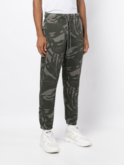 Shop Aape By A Bathing Ape Graphic-print Tapered Trousers In Green