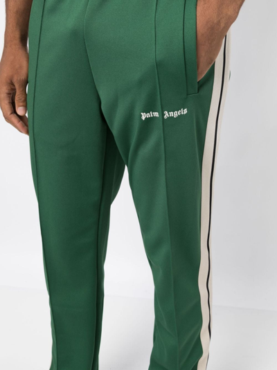 Shop Palm Angels Logo-print Side-stripe Track Pants In 绿色
