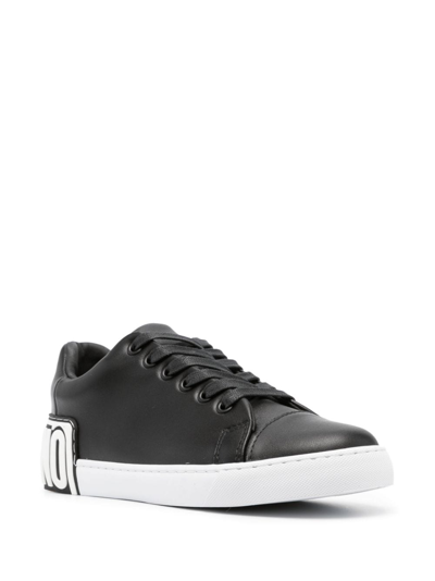 Shop Moschino Logo-patch Leather Sneakers In Schwarz