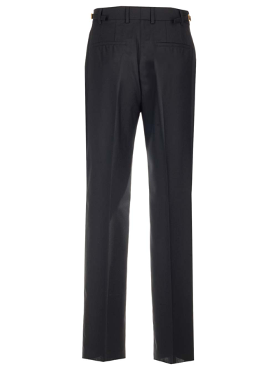 Shop Versace Tailored Wool Trousers In Black