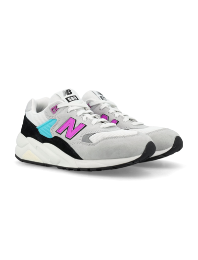 Shop New Balance 580 Low Top Sneakers In Light Grey/pink