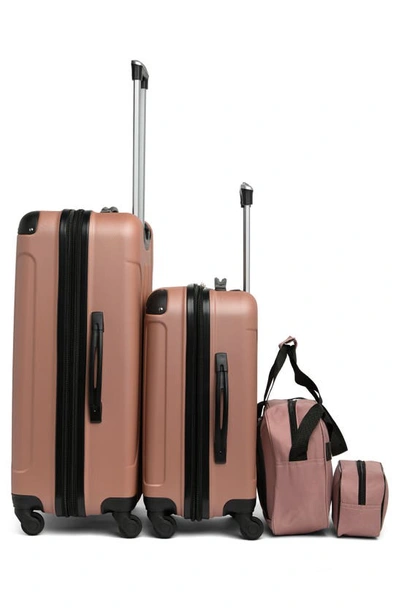 Shop Geoffrey Beene Colorado Four-piece Luggage Set In Blush