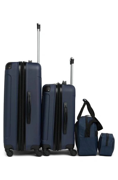 Shop Geoffrey Beene Colorado Four-piece Luggage Set In Navy