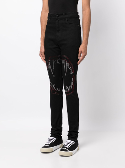 Shop Haculla Fang Lip Studded Skinny Jeans In Black