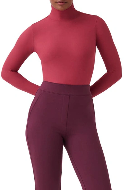 Shop Spanx Long Sleeve Smoother Thong Bodysuit In Wild Rose