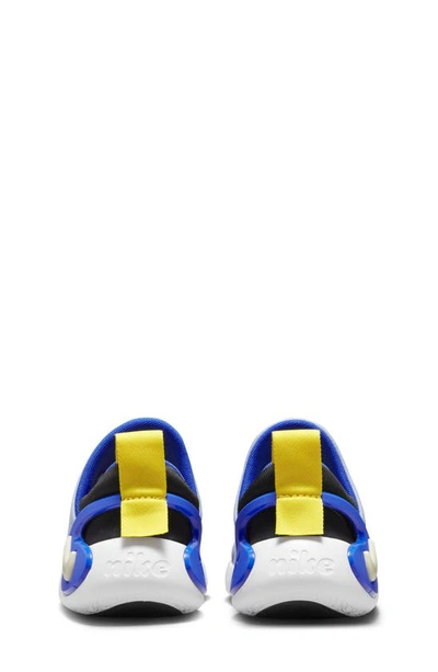 Shop Nike Kids' Dynamo Go Sneaker In Blue Bliss/ Sanddrift/ Royal