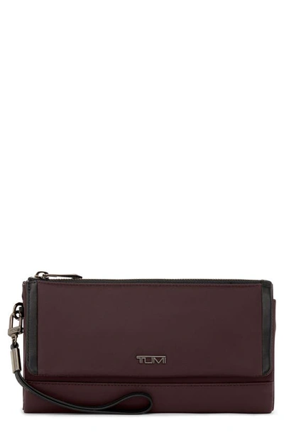 Shop Tumi Leather Travel Wallet In Deep Plum