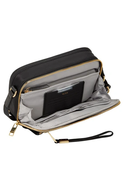Shop Tumi Langley Crossbody Bag In Black/ Gold