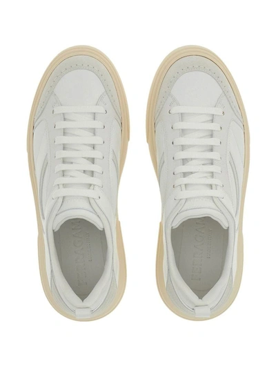 Shop Ferragamo Logo Leather Sneakers In White