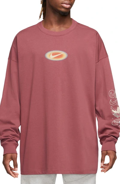 Shop Nike Sportswear Oversize Long Sleeve Graphic T-shirt In Cedar