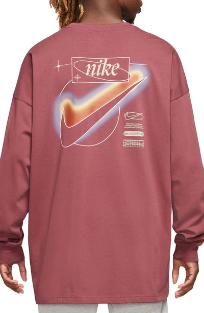 Shop Nike Sportswear Oversize Long Sleeve Graphic T-shirt In Cedar
