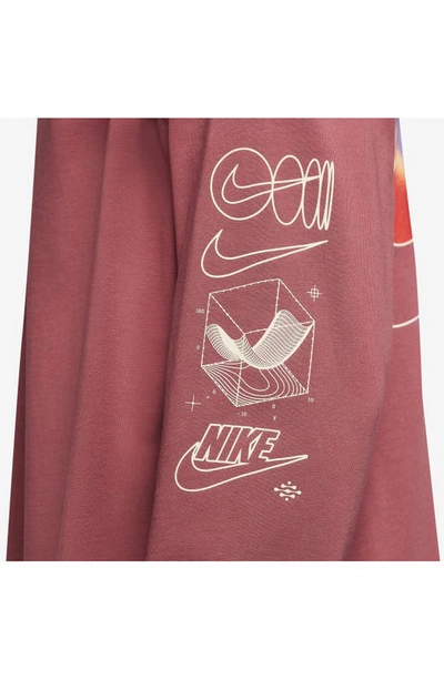 Shop Nike Sportswear Oversize Long Sleeve Graphic T-shirt In Cedar