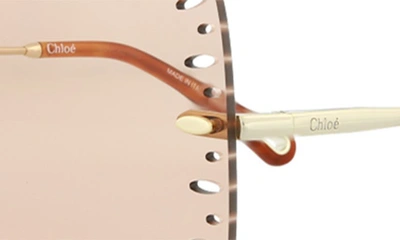 Shop Chloé 63mm Oversize Geometric Sunglasses In Gold Orange