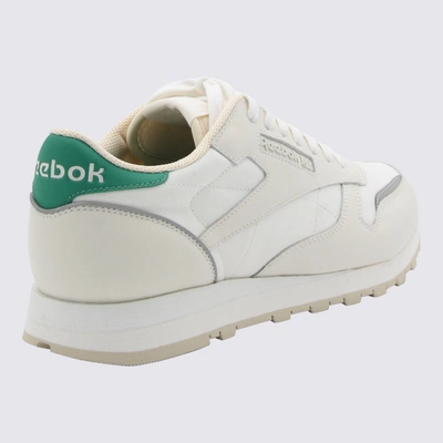 Shop Reebok White And Green Leather Sneakers