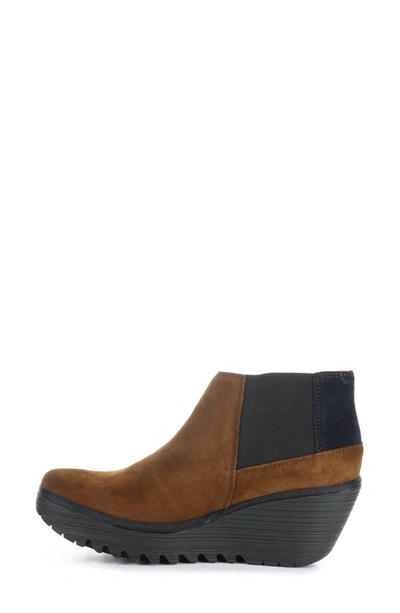 Shop Fly London Yego Wedge Bootie In 010 Camel/ Navy