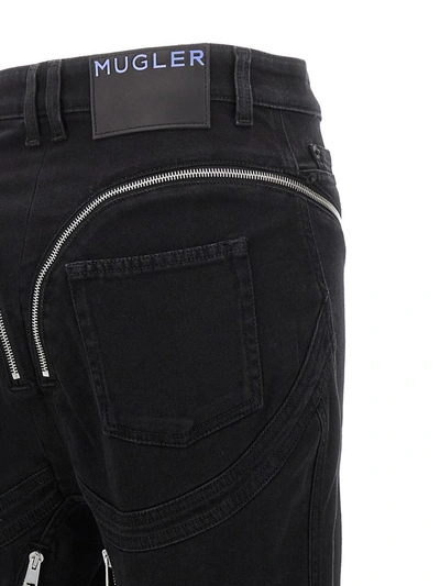 Shop Mugler 'zipped Spiral' Jeans In Black