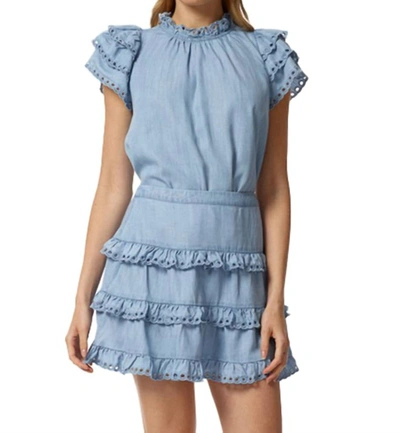 Shop Stellah Eyelet Trimmed Tiered Mini Skirt In Denim In Blue