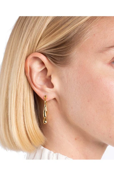 Shop Alexis Bittar Drippy Ear Jackets In Yellow Gold
