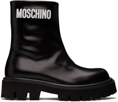 Shop Moschino Black Gummy Ankle Boots In 000 Nero
