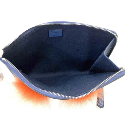 Shop Fendi Monster Navy Leather Clutch Bag ()