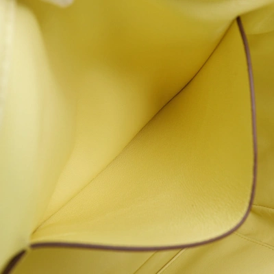 Shop Valentino Garavani Roman Stud Yellow Pony-style Calfskin Tote Bag ()