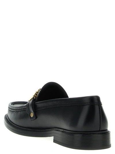 Shop Moschino Logo Loafers Flat Shoes Black