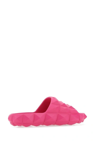 Shop Valentino Garavani Woman Fuchsia Rubber Roman Stud Turtle Slippers In Pink