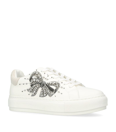 Shop Kurt Geiger Laney Bow Sneakers In White