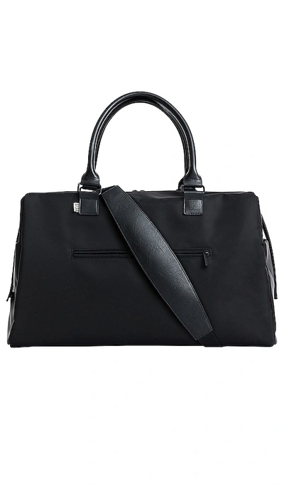 Shop Beis The Commuter Duffle In Black