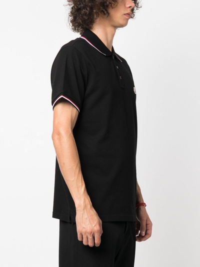 Shop Moncler Logo-patch Cotton-piqué Polo Shirt In Schwarz