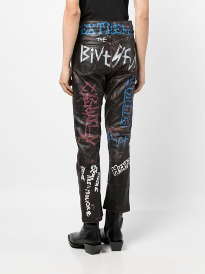 Shop Doublet Slogan-print Straight-leg Trousers In Black